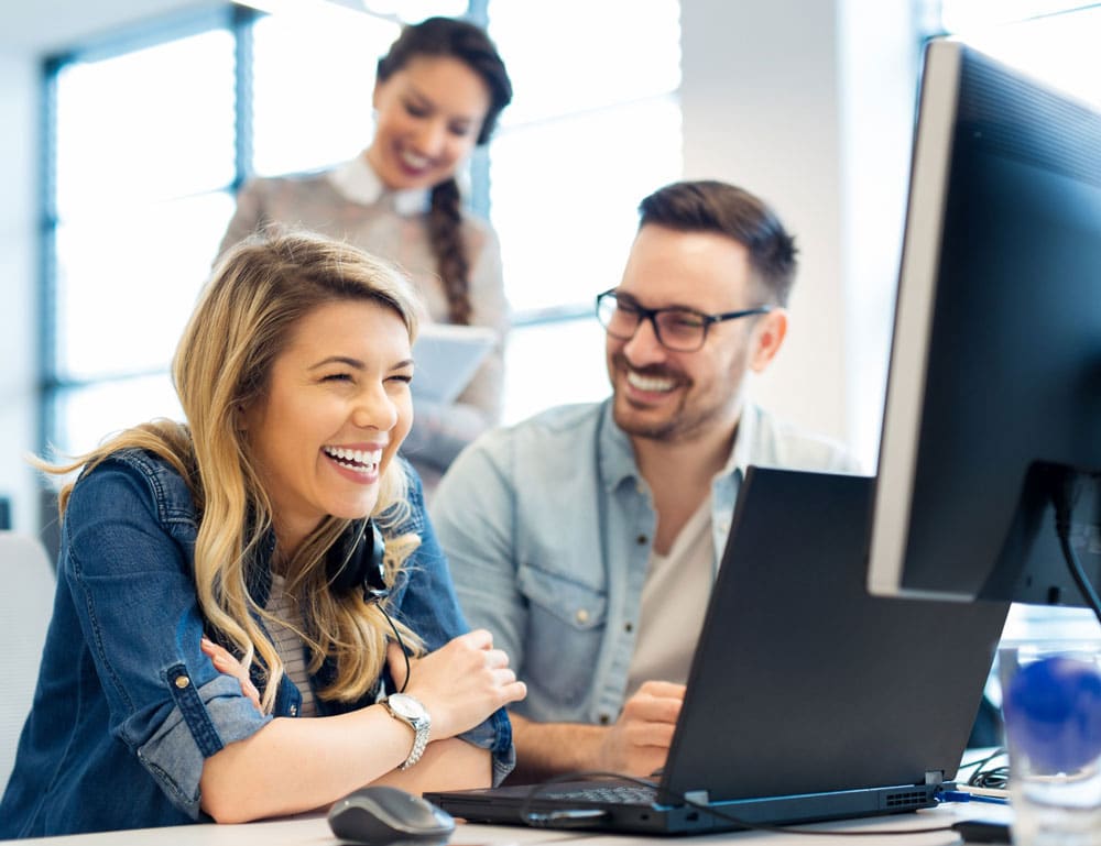 Couple-working-infront-of-computer
